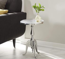 ROUND SILVER PEDESTAL TABLE