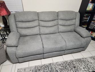 Grey recliner couch from RTG (like new)