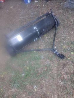 Tow behind  lawn sweeper