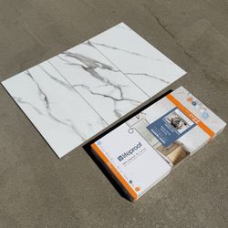 Lifeproof Mountain Brook Marble 22 MIL x 11.9 in. W x 23.8 in. L Click Lock Waterproof Vinyl Tile Flooring (17.7 sq. ft./Case)