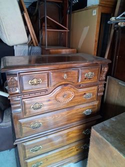 Chest of drawers with hidden compartment
