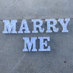 Light Up Letters Spelling “Marry Me”