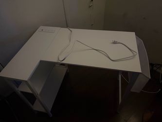 White L-Shaped Desk with Power Outlets and Storage Shelves