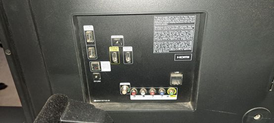 Tv stand, t.v. and sound bar