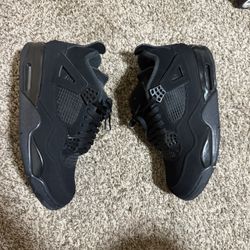 Black Cat Jordan 4s