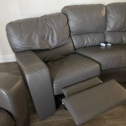 Reclining leather sofa