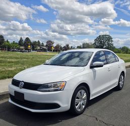 2014 VW Jetta SE 1.8T, 87K miles, runs and drives great, clean title.