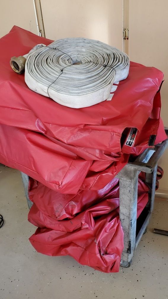 100 ' feet 1.5" fire hose. Stored not used