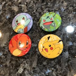 Pokémon Lot Of 4 Pinback Pins. Size 1 1/4 inches . Brand New Only Opened Packaging To Take This Picture. Smoke free home