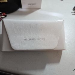 White leather michael kors glass case holder