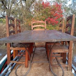 Mesquite and Wrought Iron Dining Room Table And Chairs