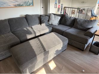 Sectional couch with ottoman