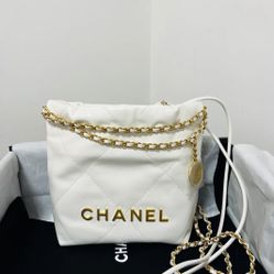  Chanel White Quilted Drawstring Bag with Gold Chain & Logo Charm