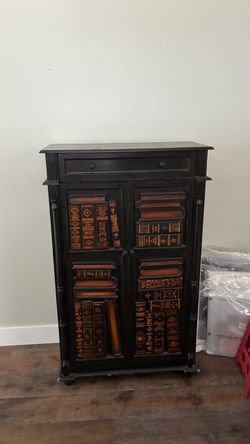 Black Cabinet with Book Spine Door Design