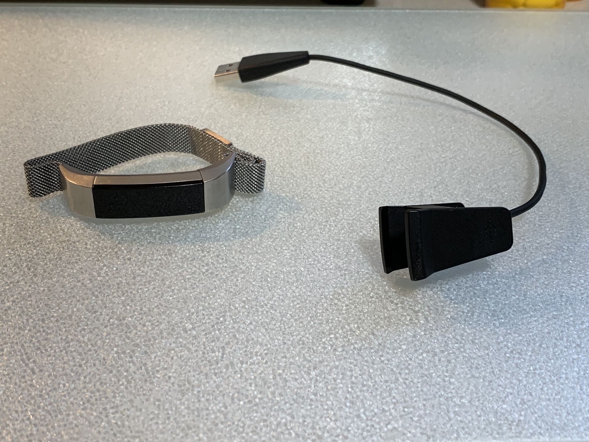 Fitbit Alta with charger and 2 extra bands