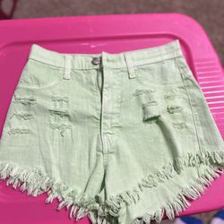 beautiful mint green distressed, short shorts size M (8-10)