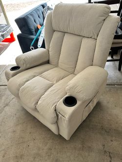 White, recliner, with heat and massage capability.