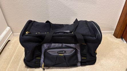 Rolling duffle bag for carry on