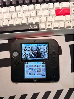 2ds modded (with lots of games comes with carrying case and charger)
