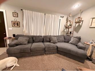 Dark grey piano wedge couch