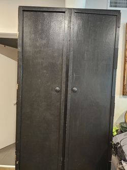 Tall storage cabinet