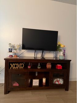 Dark Wood TV Stand / Entertainment Center with Glass Doors
