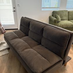 Brown Futon. Opens Up As Bed. 