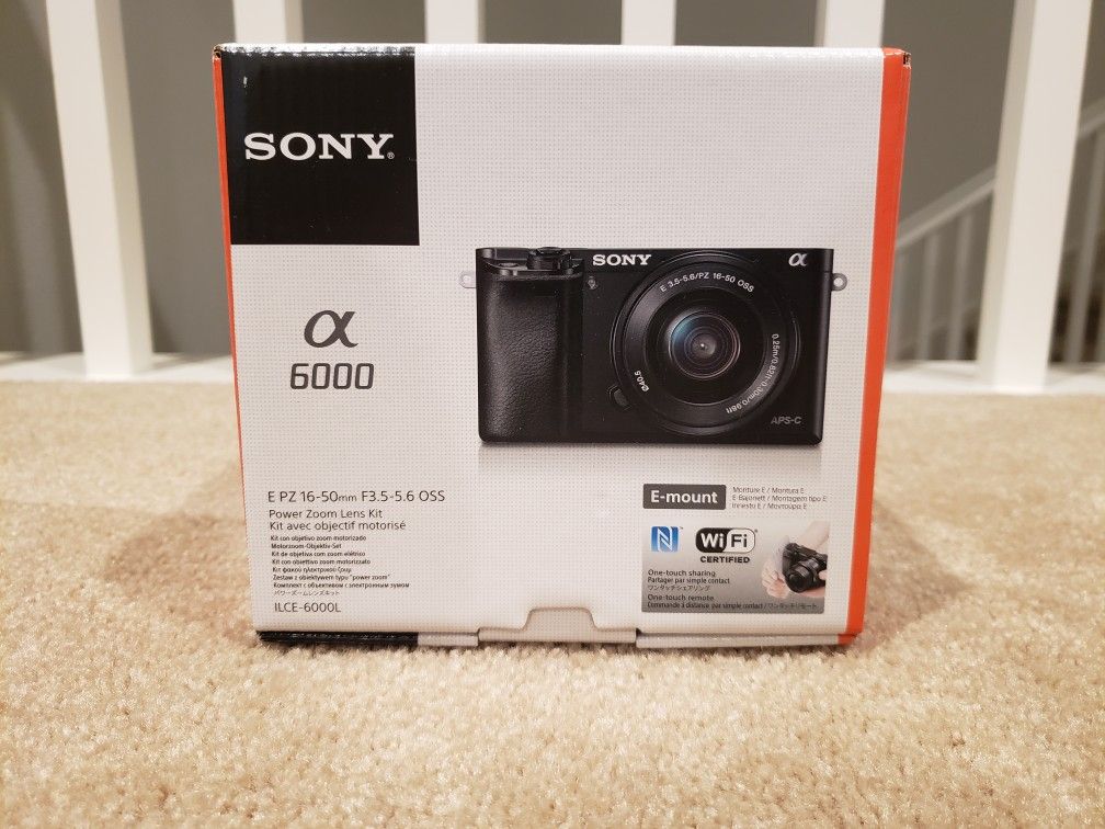 BRAND NEW SONY A6000 W/ 16-50mm LENS