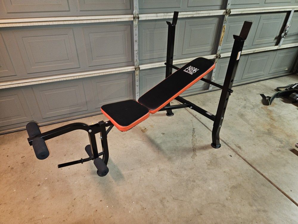 Bench Press Machine With Leg Curl Extension Piece.