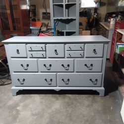 Wood dresser dove detailed drawers painted light gray