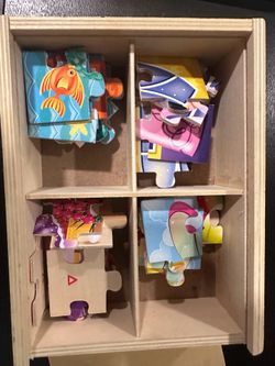 Melissa & Doug. New wooden puzzles