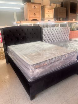 Queen bed frame with mattress and box spring