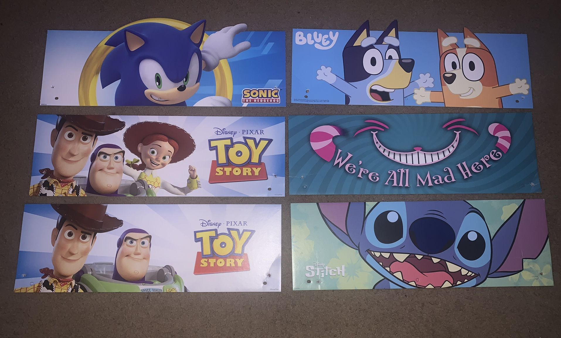 disney, bluey and sonic signs