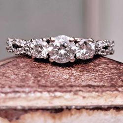 $4,000 At Zales Natural One Carat Three Stone Braid Engagement Ring