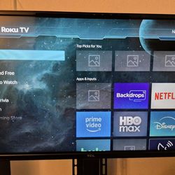 TV TCL 32" ROKU WITH RECHARGEABLE REMOTE CONTROL. LIKE NEW,  ADJUSTABLE TABLE  MOUNT INCLUDED.
