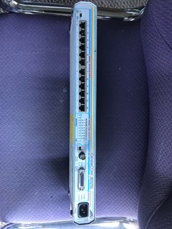 ATI Allied Telesyn CentreXom 3012SL 12-port Wired External Ethernet Network Hub. Slightly used.