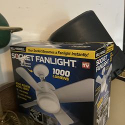 a Bell + Howell Socket Fanlight. It is a fan and light combination that screws into any standard light socket
