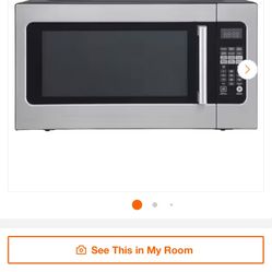 Magic Chef 24.4 in. W. 2.2 cu. ft. Countertop Microwave Oven in Stainless Steel, with Gray Cavity