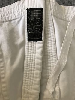 Jiu Jitsu Gi-White...unsure of size. Fit 11 yr old