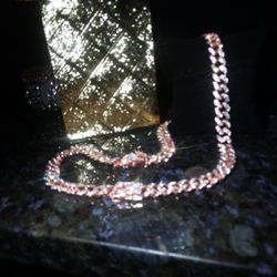 Rare Rose Red Gold One Luxury Lab Diamonds 26" Cuban Link Chain Imported 
This chain breaks down into a 18-in and bracelet set. Pick up near the Perim