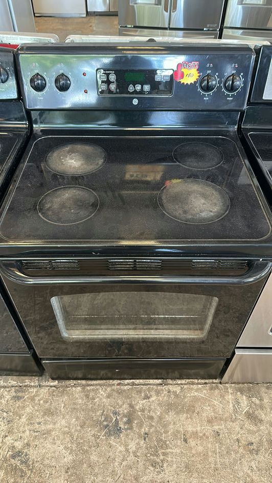 Black GE Electric Range with Glass Top