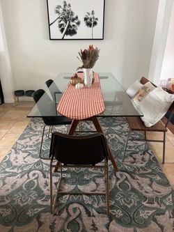 Glass Top Dining Table with Wood Base, bench and chairs.