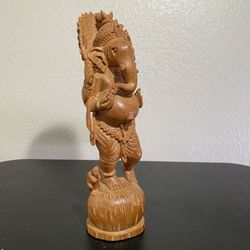 Wood carved Ganesha Hindu figure