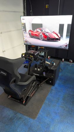 Racing/Flight simulator cockpit and screen