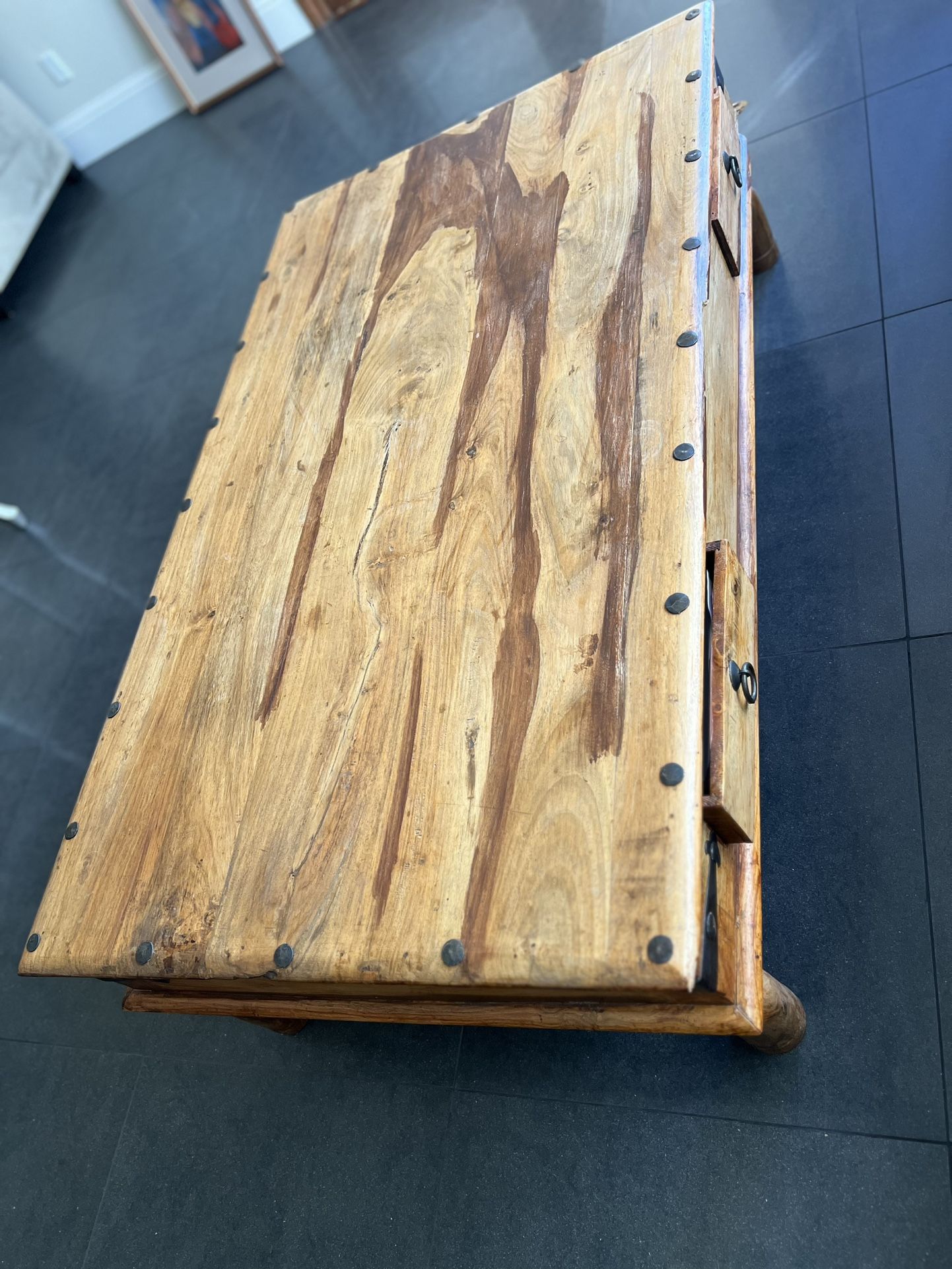 Large Coffee table made of hard wood.