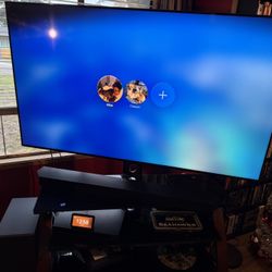 $200 LOWER PRICE——LG 75” TV Plus Glass Stand. 