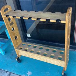 Rolling fishing pole rack