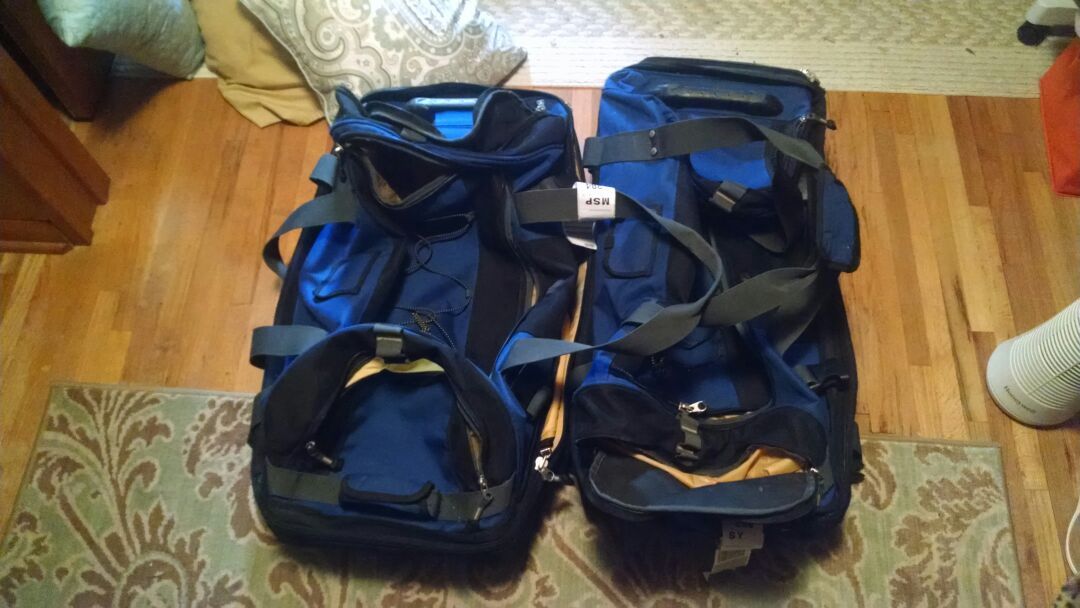 Two heavy duty high end duffle bags. Very large with many handy compartments.