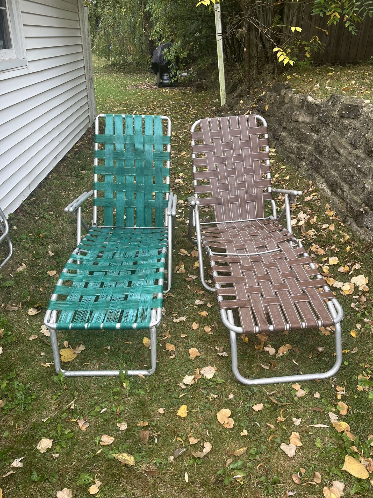 Vintage-style aluminum folding chaise lounge chairs