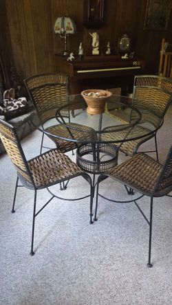 Glass & Wrought Iron table and 4 chairs